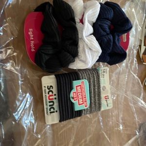 Two new packages of hair elastics